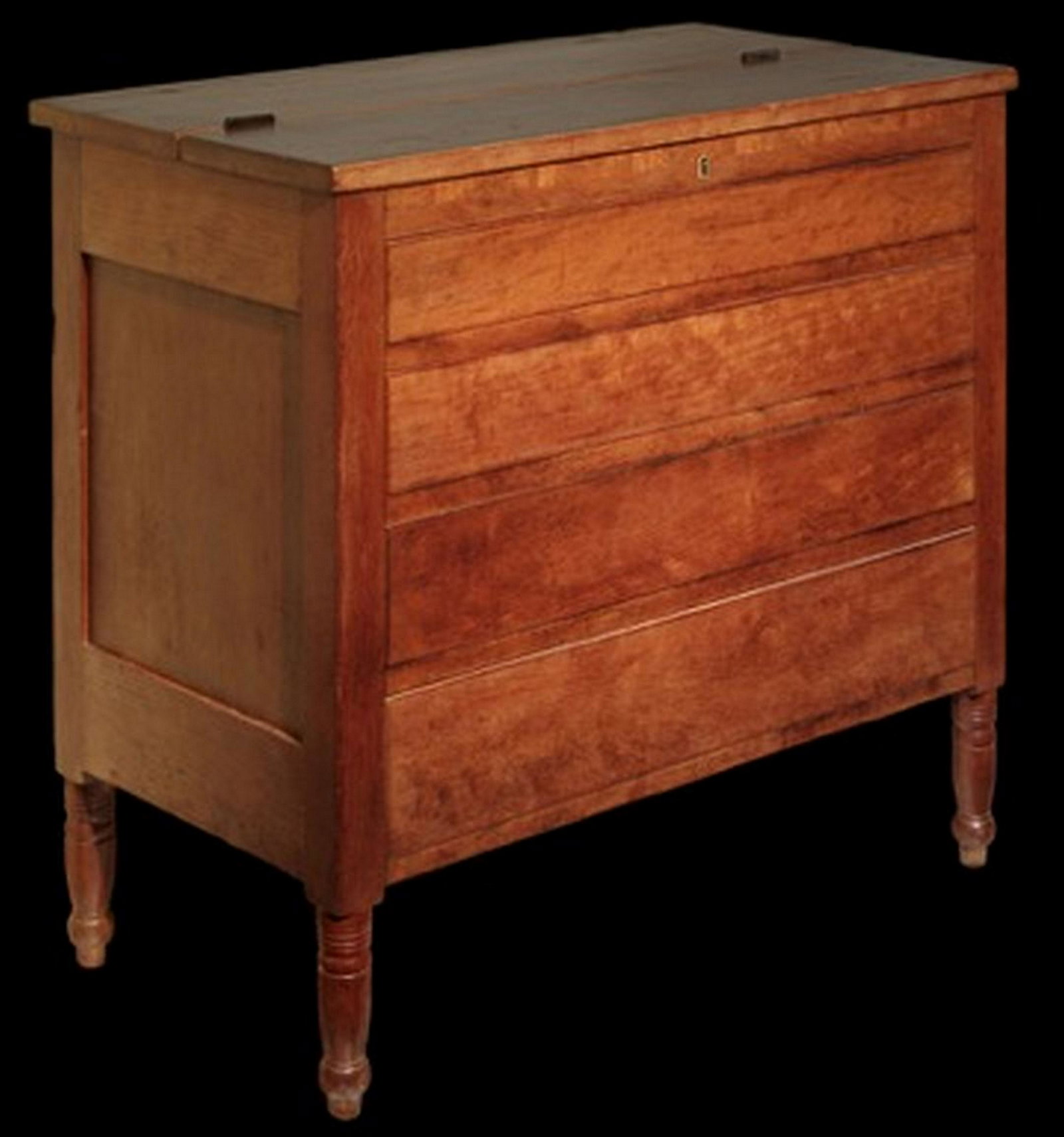 Cherry Sugar Bureau: Cherry 34 1/4" x 34 5/8" x 18 5/8" sugar bureau with partitioned interior attributed to the Lexington cabinet maker Robert Wilson. See Mary McCinton's article in the May 1973 The Magazine Antiques for