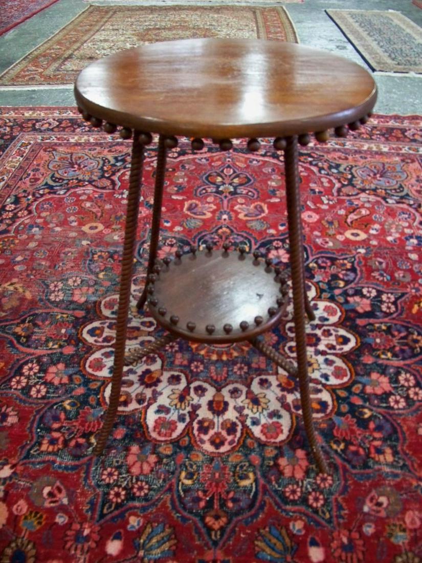 Uniquely Styled Mahogany Antique Cottage Table: With great splayed twist legs with balls affixed to both the underside of the table and the piece above the stretcher. In general good condition with some minor issues on top. Overall, the table is 28