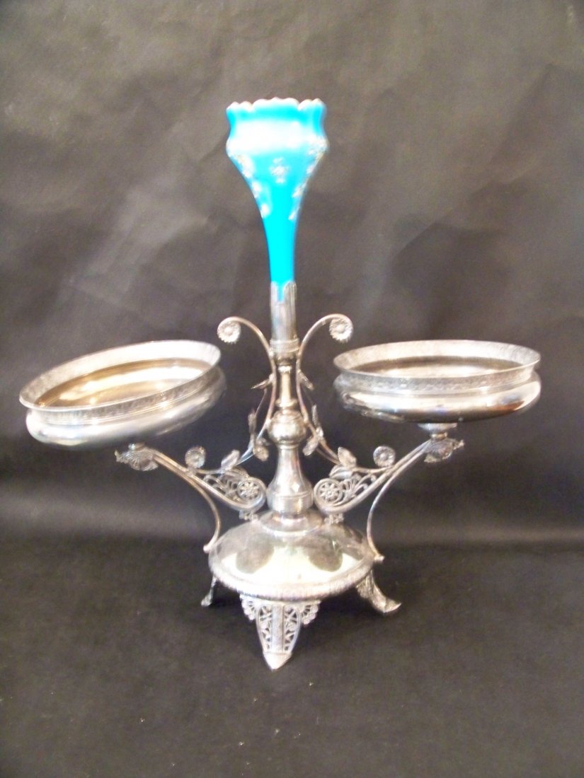 Silverplate Epergne with Blue Vase, James Tufts, Boston: Silverplate Epergne with Blue Vase, James Tufts, Boston. 22 1/2" tall, one bent foot (leans)