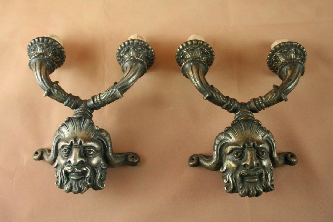 French Neoclassical Gothic Bronze Satyr Light Sconces: Pair Bronze Satyr SconcesA wonderful pair of all original bronze Neoclassical style wall-mount Satyr SconcesHeight: 20 cm and width: 18 cmCOUNTRY: FranceDATE OF MANUFACTURE: 1860-1890MATERIALS: Bronze