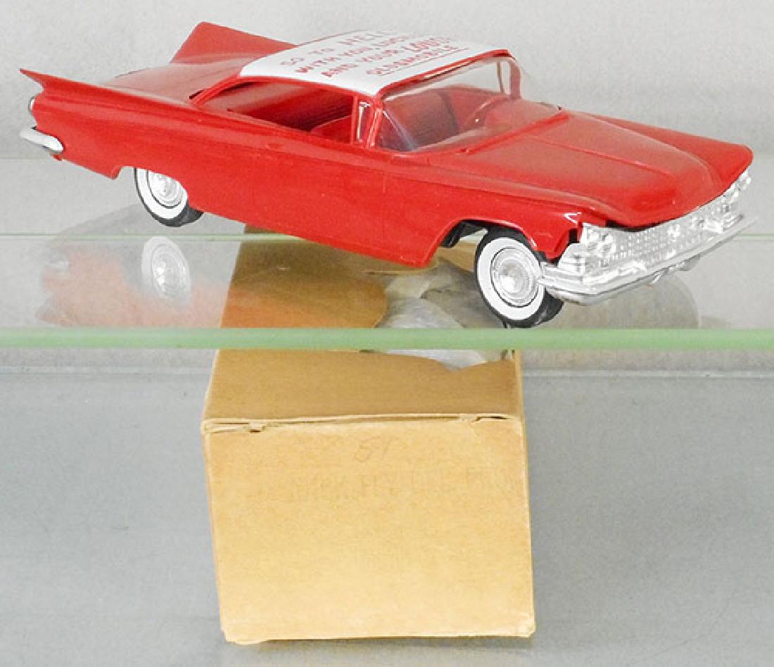 AMT 1959 BUICK INVICTA PROMO: orange & white, friction working, So To Hell with You, Lucille and Your Lousy Oldsmobile written on roof by a Buick engineer, minor body warp on passenger side, orig box, C8.