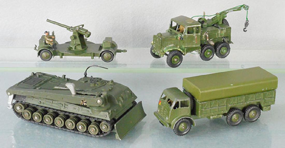 4 DINKY ARMY VEHICLES: 161B AA gun, 661 Recovery Tractor, die cast chipping, 669 Leopard Recovery Tank, 622 Army Truck w/passengers, C4-6.