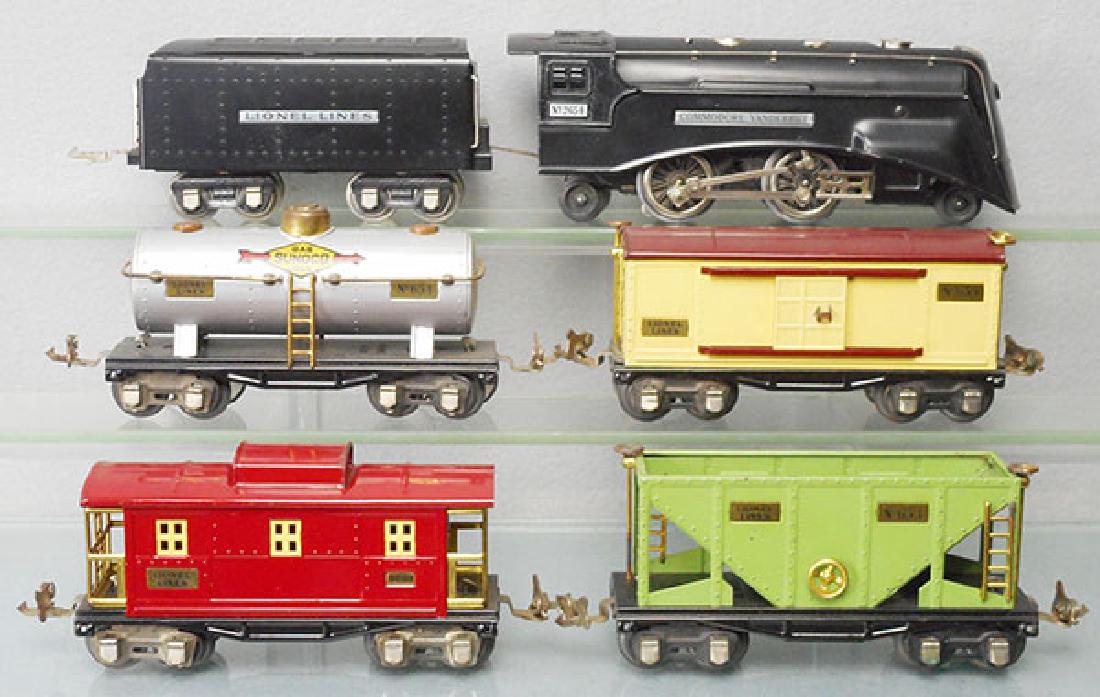 LIONEL 273E TRAIN SET: O ga, 265E loco, 262T tender, missing die cast box coupler, 654 Sunoco tank, 655 box car, 653 hopper, 657 caboose, orig boxes rough, set box worn, C6-7.