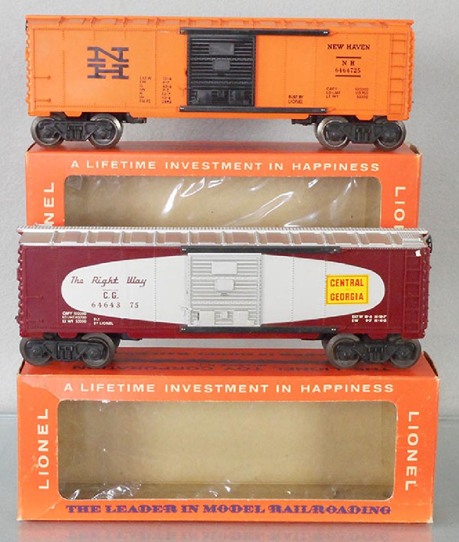 2 LIONEL BOX CARS: O ga, 6464-725 New Haven, glossy lettering, 6464-375 Central of Georgia, w/no built date, orig boxes minor wear, 1 has graffiti, C8-9.