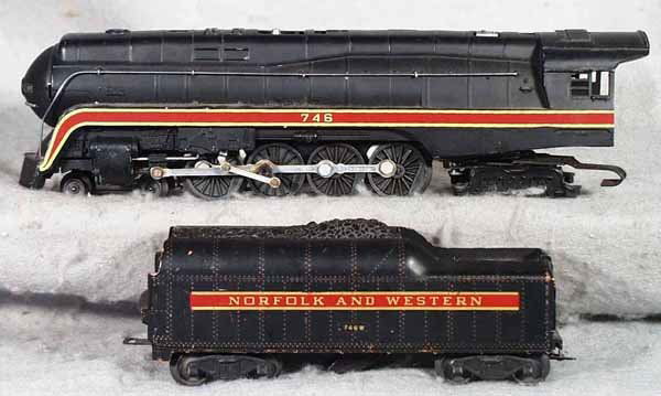 018: LIONEL 746 N&W LOCO & TENDER: O ga, 746 N&W loco, 746W short-stripe tender, 1 rear step broken off, tender is playworn w/scratches & paint loss, loco C5, tender C3. Complete information covering terms, conditions, payment & shippi