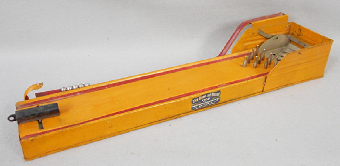 BRINKMAN 500 THE BOWLING ALLEY: painted pressed steel, 24 in long, w/pins & balls, working, C6.