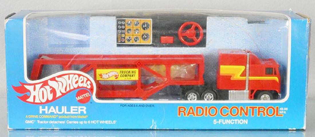 MATTEL HOT WHEELS 50-51 HAULER: ca 1981, radio controlled, orig box taped closed, some wear, C8-9.