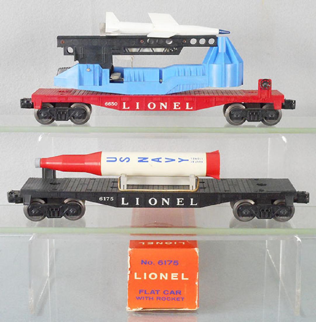 2 LIONEL SPACE CARS: O ga, 6650 missile launching car, 1 step broken, missing has 2 broken fins, 6175 flat car w/rocket & orig box, minor wear, C7-8.