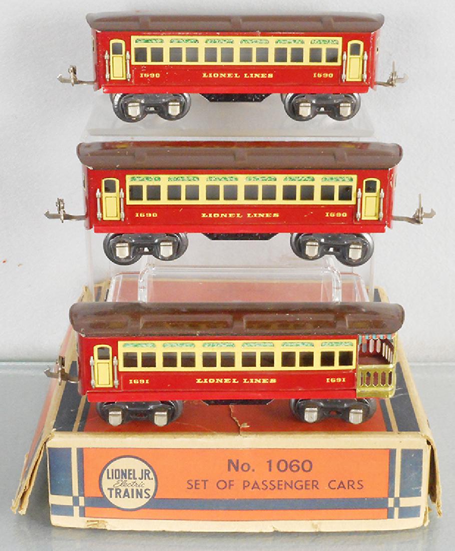 LIONEL 1060 PASSENGER CARS: O ga, 2 #1690 coaches, 1691 obsv, maroon & red, orig boxes minor wear, C6-7.