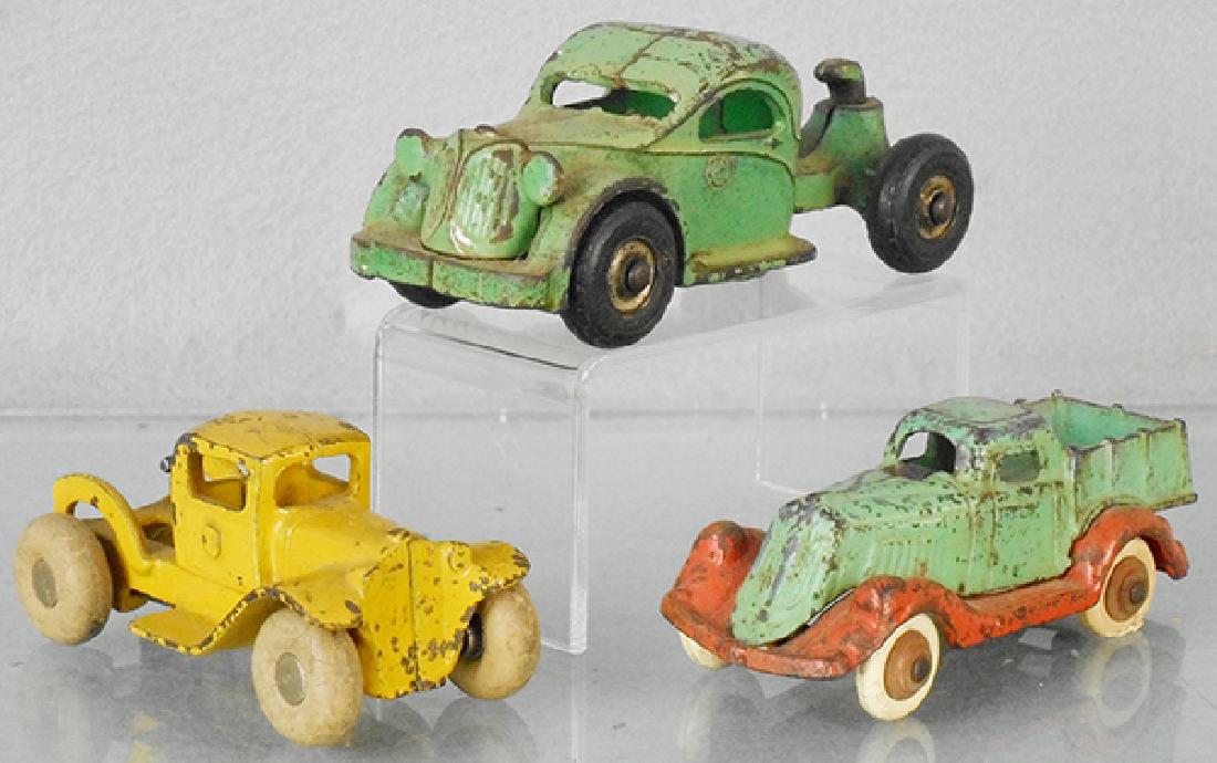 3 CAST IRON TRUCKS (1 of 1)