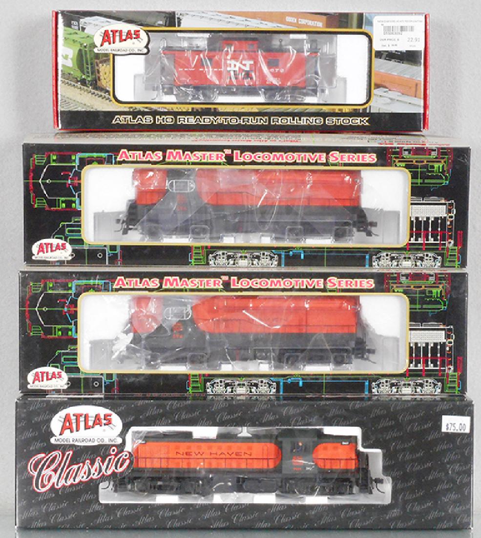 3 ATLAS NEW HAVEN LOCOS: HO ga, 2-rail, 7107, 7117, 7118, w/6309-1 caboose, orig boxes & inserts, C9.
