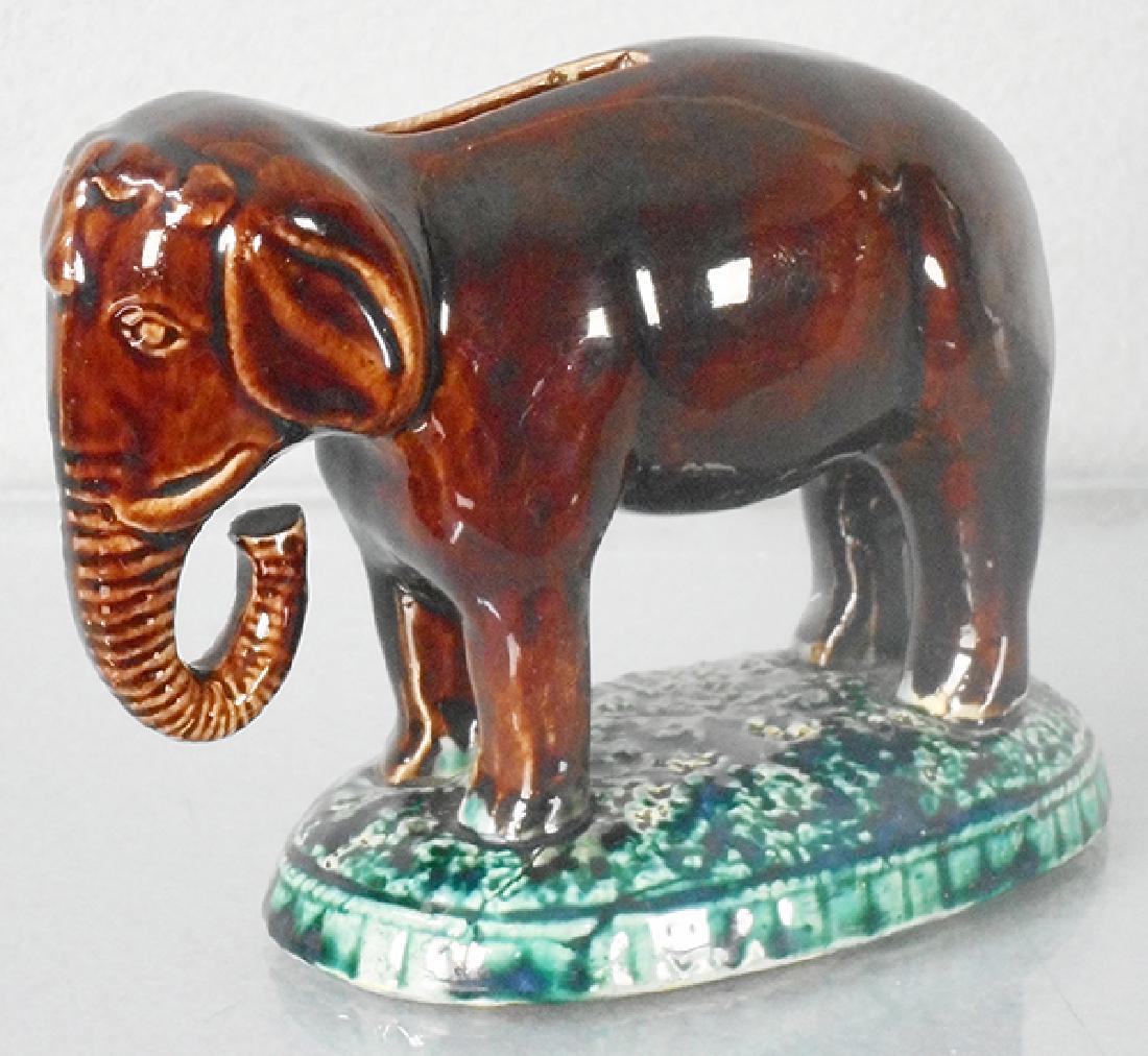 ELEPHANT ON BASE BANK (1 of 2)