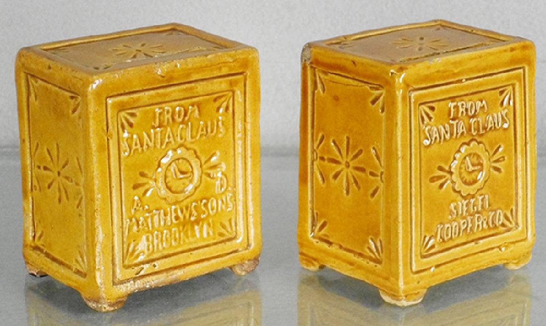 2 SANTA CLAUS ADVERTISING SAFE BANKS: Austrian, ca 1900, earthenware, 3 1/2 in tall, minor wear on base feet, 1 has small chip in corner, C7-8.