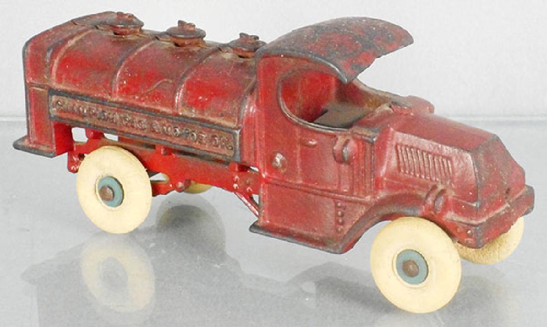 CHAMPION MACK TANK TRUCK: painted cast iron, red, 8 in long, Champion Gas & Motor Oil, C5-6.