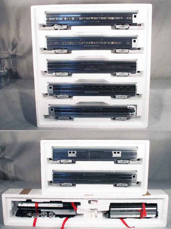 MTH NYC EMPIRE EXPRESS TRAIN SET: 054 ga, 3-rail, 3016L loco & tender, w/sound & smoke, 6504 5-car set, 6604 2-car set, all are Empire Express, orig boxes minor wear, C8-9.