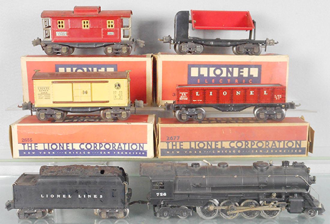 LIONEL TRAIN SET: O ga, 726 loco w/atomic motor, restored w/cab numbers missing on 1 side, minor bend in cab roof, 2666W tender, rear coupler incom, 2655 box car, 2677 gondola, 3659 dump car, 2657 caboose, roof worn, o