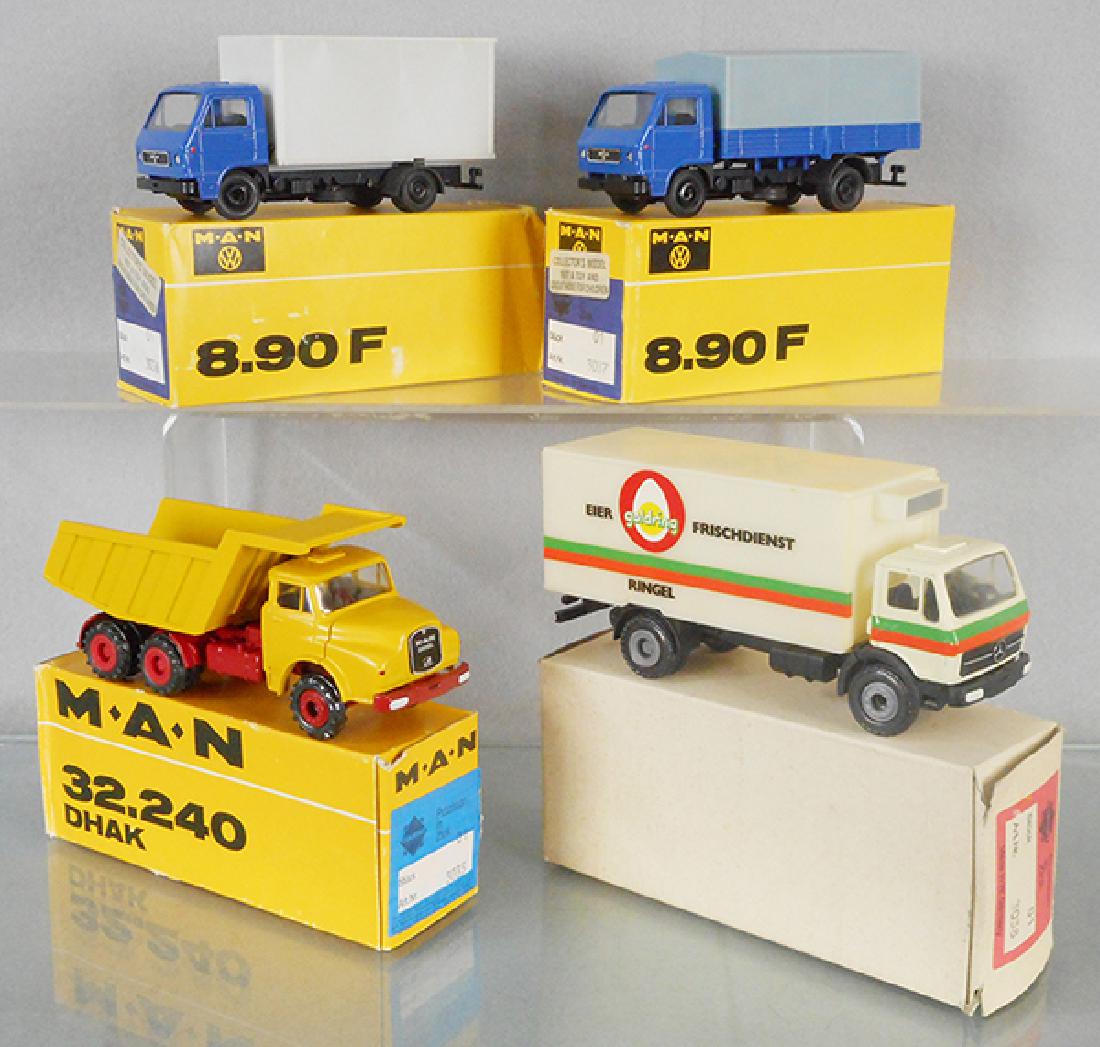 4 CONRAD MODEL TRUCKS (1 of 1)