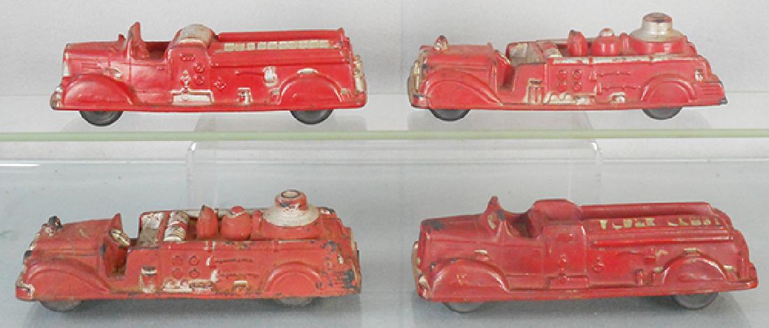 4 AUBURN RUBBER FIRE TRUCKS (1 of 1)