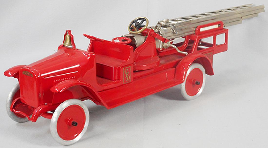 BUDDY L 205-A AERIAL LADDER TRUCK: painted pressed steel, 30 in long, professionally restored, C9.