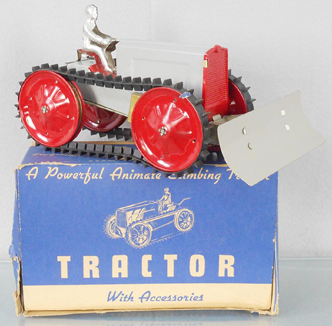 WOODHAVEN METAL ANIMATE TRACTOR: litho tin, 11 in long, windup working, orig box minor wear, C9.