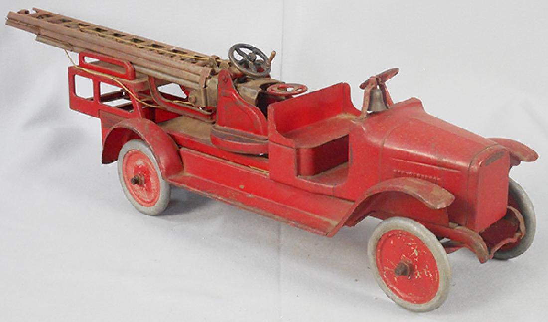 BUDDY L 205A AERIAL LADDER TRUCK: painted pressed steel, 37 in long, overall surface oxidation, C5.