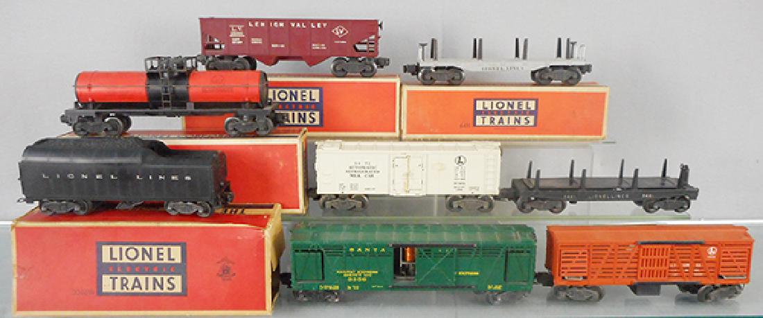 8 LIONEL FREIGHT CARS: O ga, 6456 LV hopper, 6411 flat car, 6315 chemical tank car, 2046W tender, 3472 milk car, 3461 automatic dump car, 3356 horse car, 3656 cattle car, catwalk end chipped, 4 orig boxes only, minor wear, 