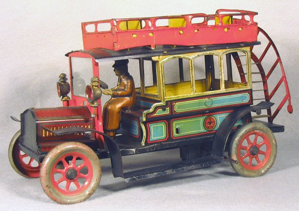 HANS EBERL DOUBLEDECKER BUS: litho & handpainted tin, clockwork working, glass windshield, lead headlamps, 10 in long, C5-6.