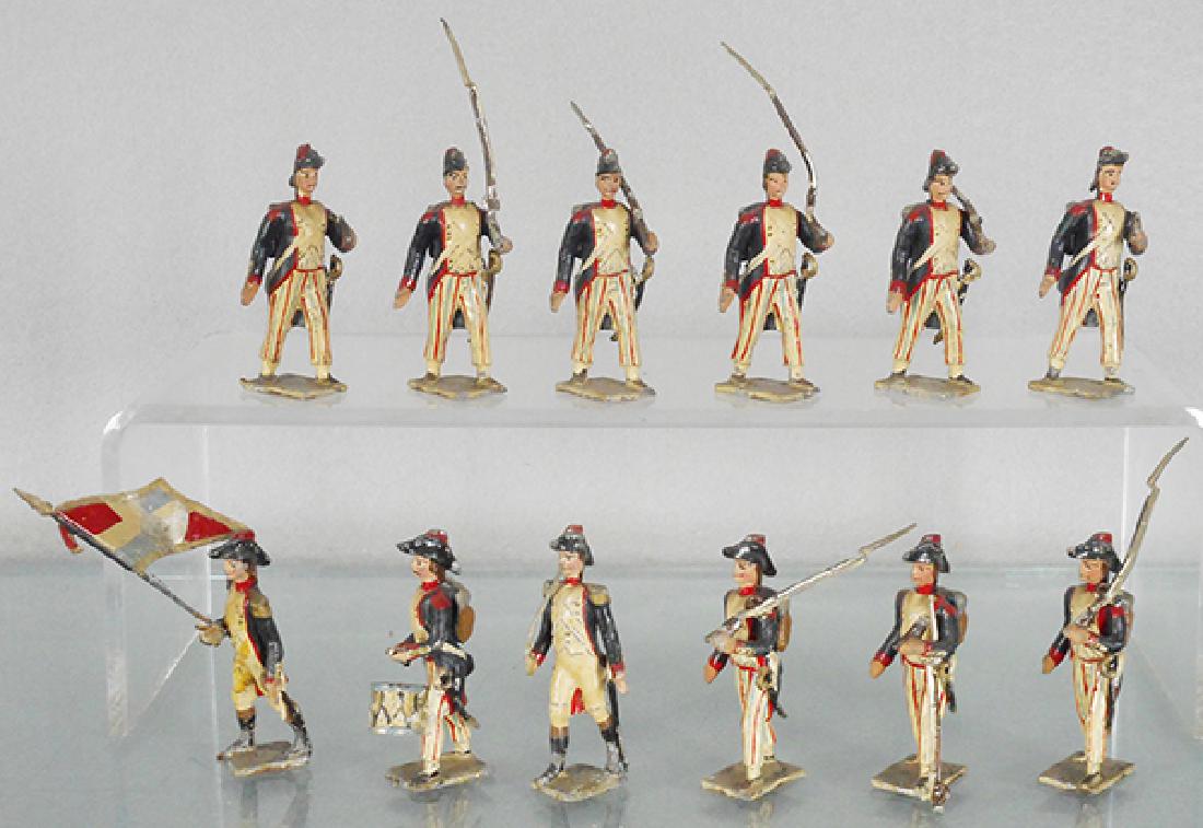 MIGNOT SET 22 VOLUNTEERS MARCHING: 12 figures w/officer, drummer & flag bearer, 2 figures have repainted rifles, 1 missing rifle, C5-6.