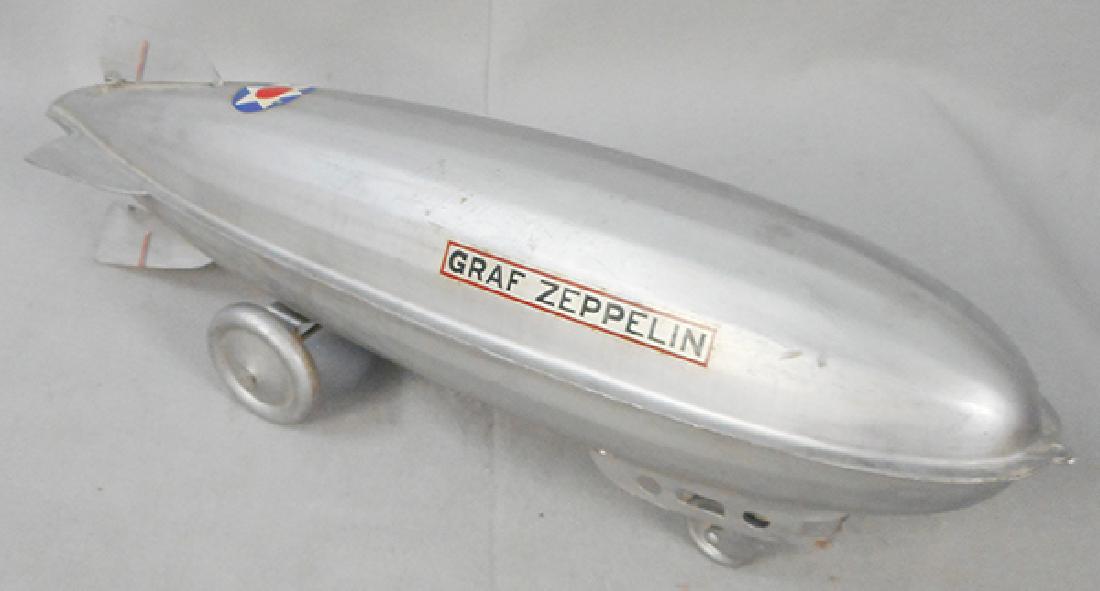 STEELCRAFT GRAF ZEPPELIN: painted pressed steel, 25 in long, repainted, 2 fins have broken welds, C5.
