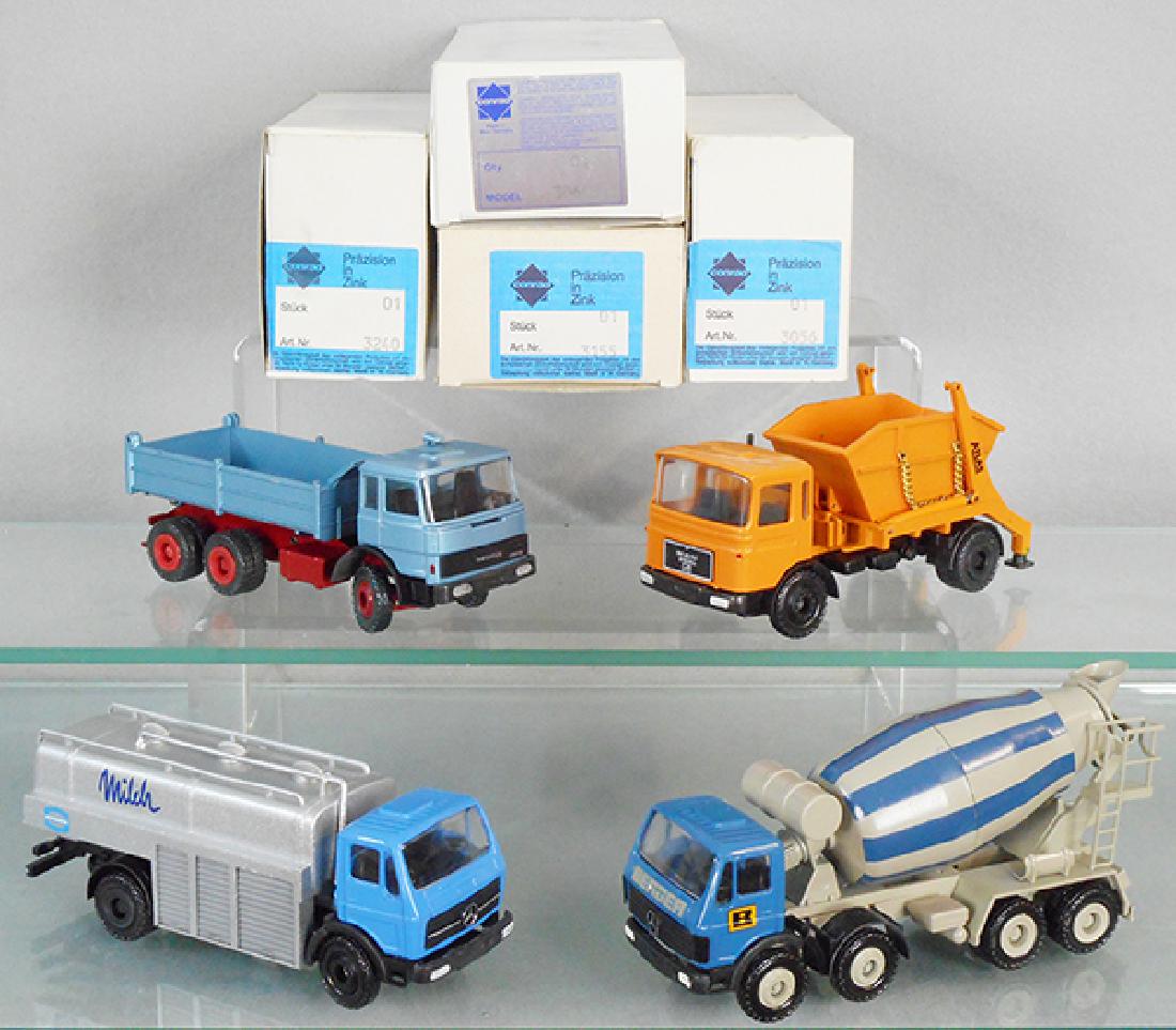 4 CONRAD MODEL TRUCKS (1 of 1)