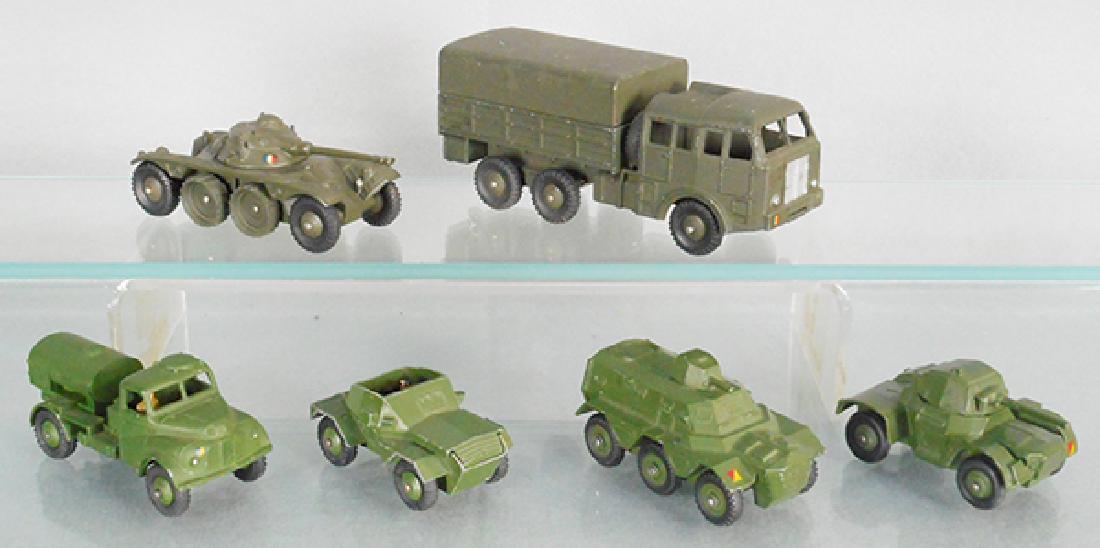 6 DINKY MILITARY VEHICLES: 670 armoured car, 80D Berliet all terrain, 643 army water tanker, 673 scout car, 80A Panhard tank, 676 armoured personnel carrier, C6-8.
