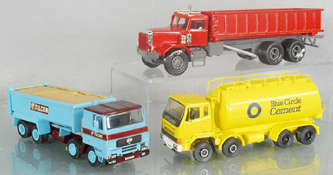 3 AO SMITH WHITE METAL TRUCKS (1 of 1)