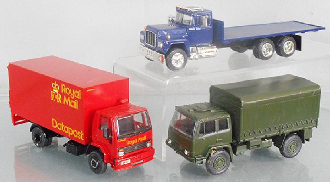 3 AO SMITH WHITE METAL TRUCKS (1 of 1)