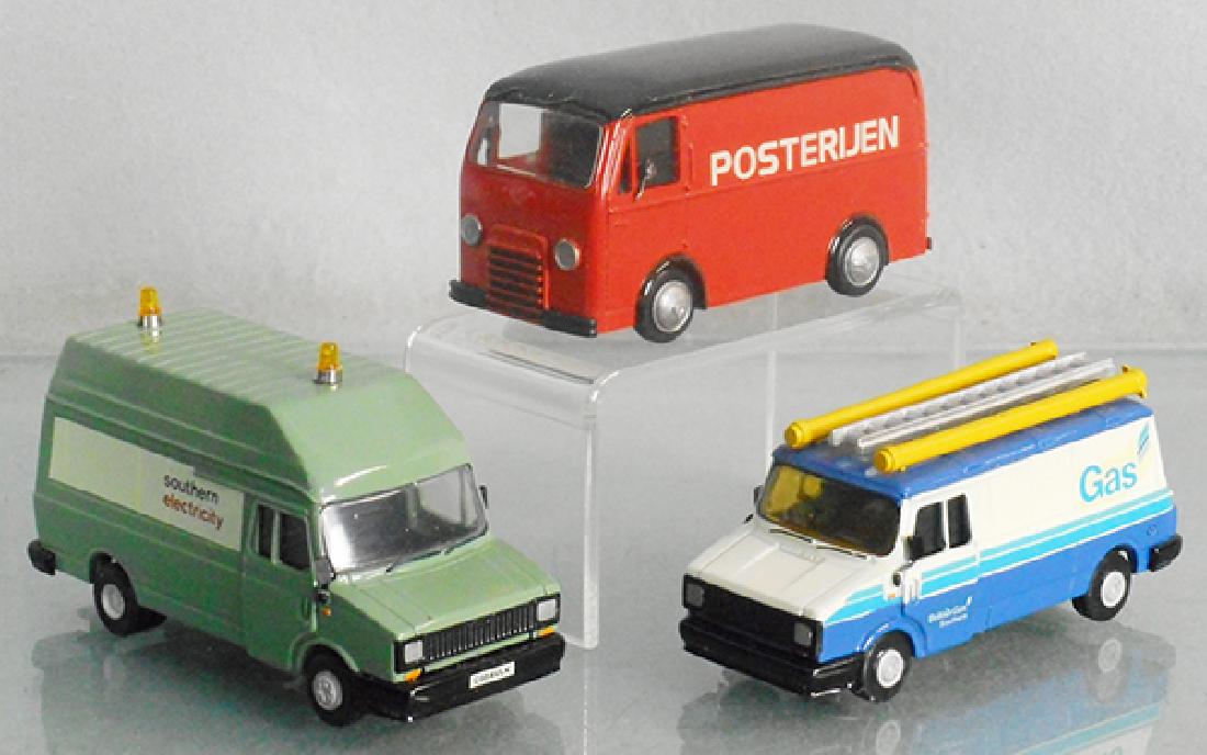 3 WHITE METAL TRUCKS (1 of 1)