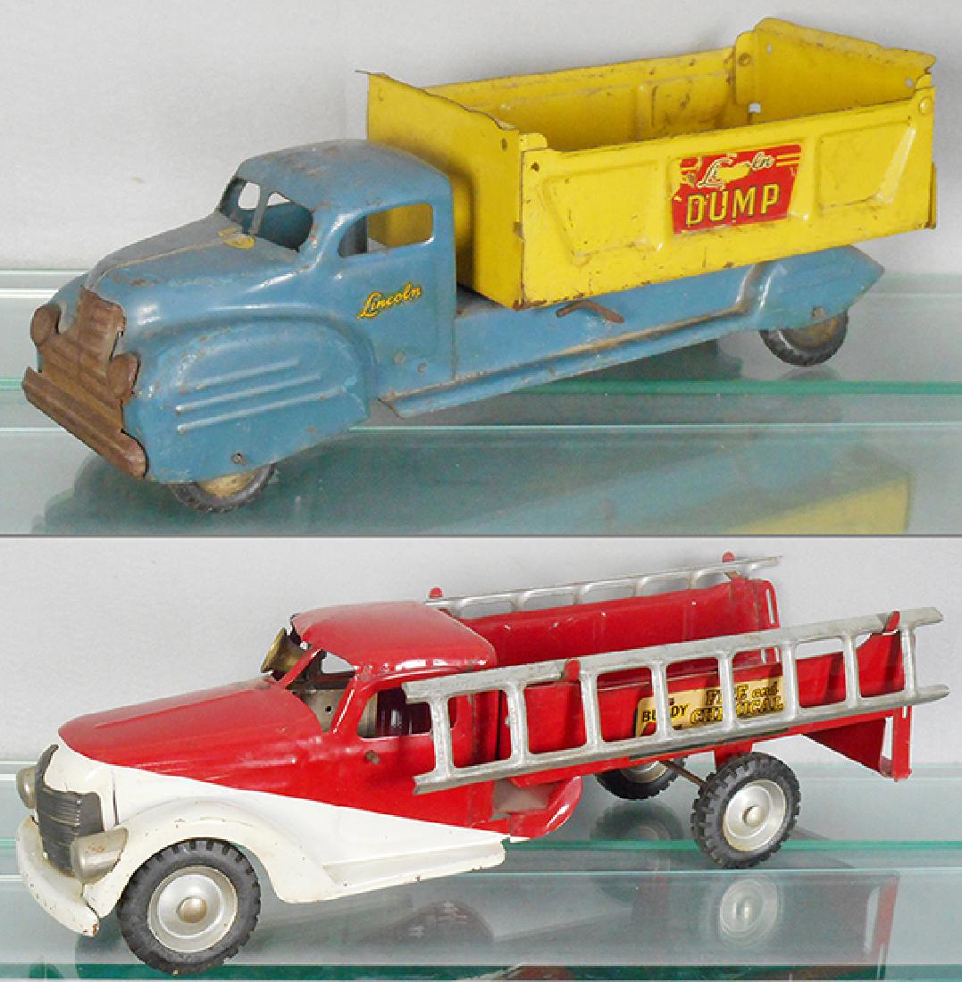 2 TOY TRUCKS (1 of 1)