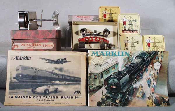 MARKLIN CONSTRUCTOR CAR PARTS & ACCESSORIES: 1109M Motor, clockwork, working; 1110B Electric Headlight Kit; 4 Tin Boxes, 1 has screws, etc; 1953 Catalog; 1936 Catalog, shows constructor cars & trains, some wear, C5. Please read and understand th