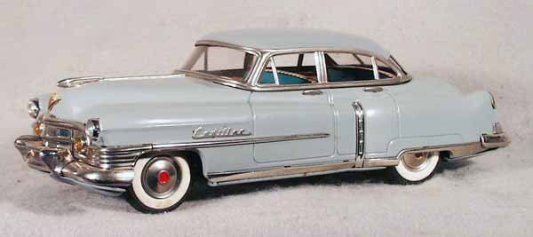 MARUSAN CADILLAC: lithographed tin, friction working, 12 1/2 in long, some very minor surface oxidation spots on hood & roof, C8. Please read and understand the payment and new shipping Terms and Conditions before bidd