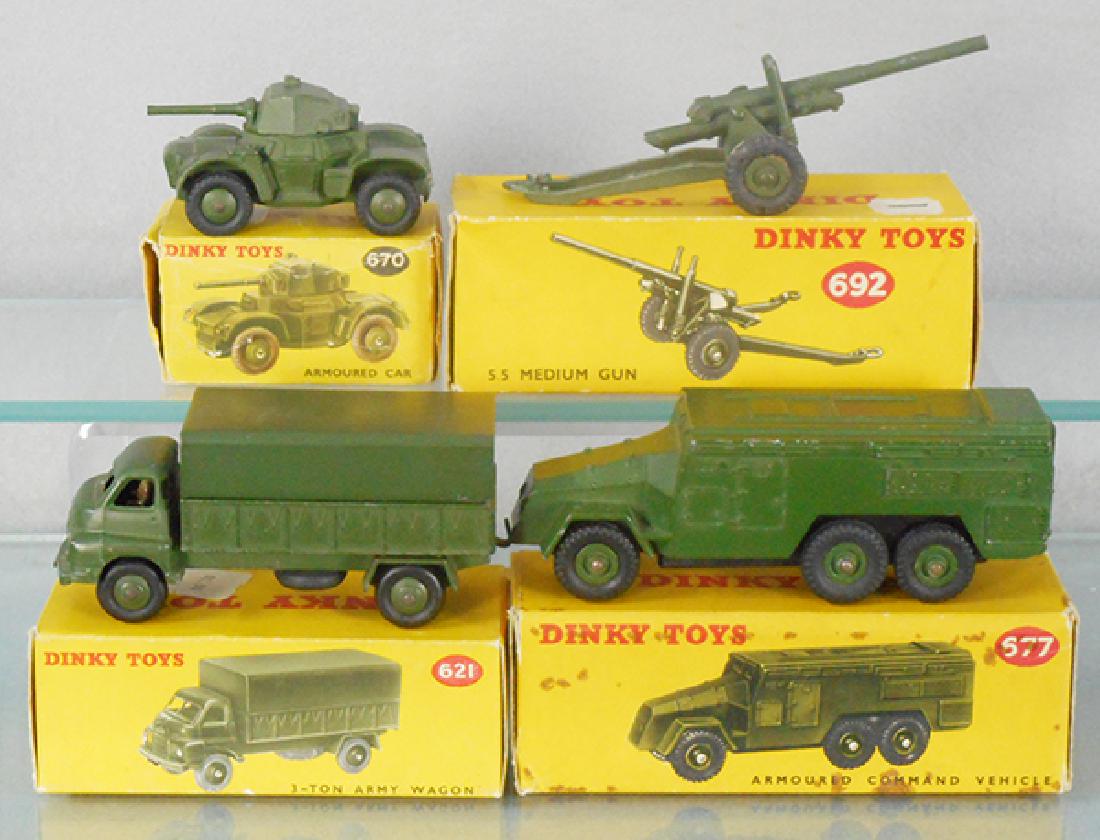 4 DINKY MILITARY VEHICLES: 670 Armored Car, 621 1 Ton Truck, 692 Medium Gun, 677 Armored Command Vehicle, orig boxes minor wear, C7-8.