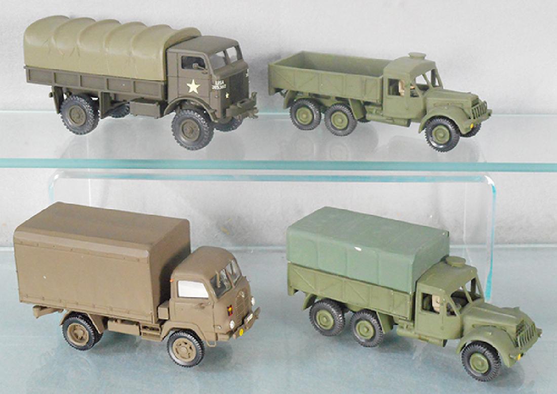 4 WHITE METAL ARMY TRUCKS (1 of 1)