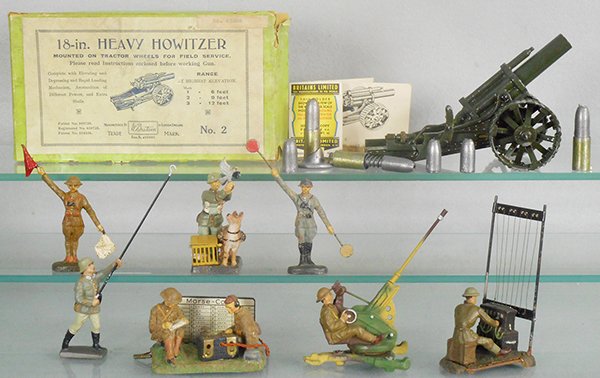 BRITAINS,LINEOL & ELASTOLIN SOLDIERS: Britains #2 Heavy Howitzer w/shells & instructions, orig box some wear, Lineol AA Gun, Radio Operator, base damaged, Signal Corp Lineman, Elastolin Carrier Pigeon, Morse Code Operators & 2 Signalmen, 