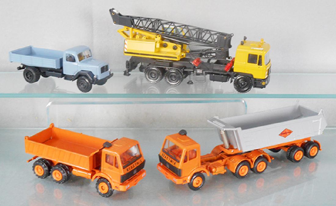 4 CONRAD MODEL TRUCKS (1 of 1)