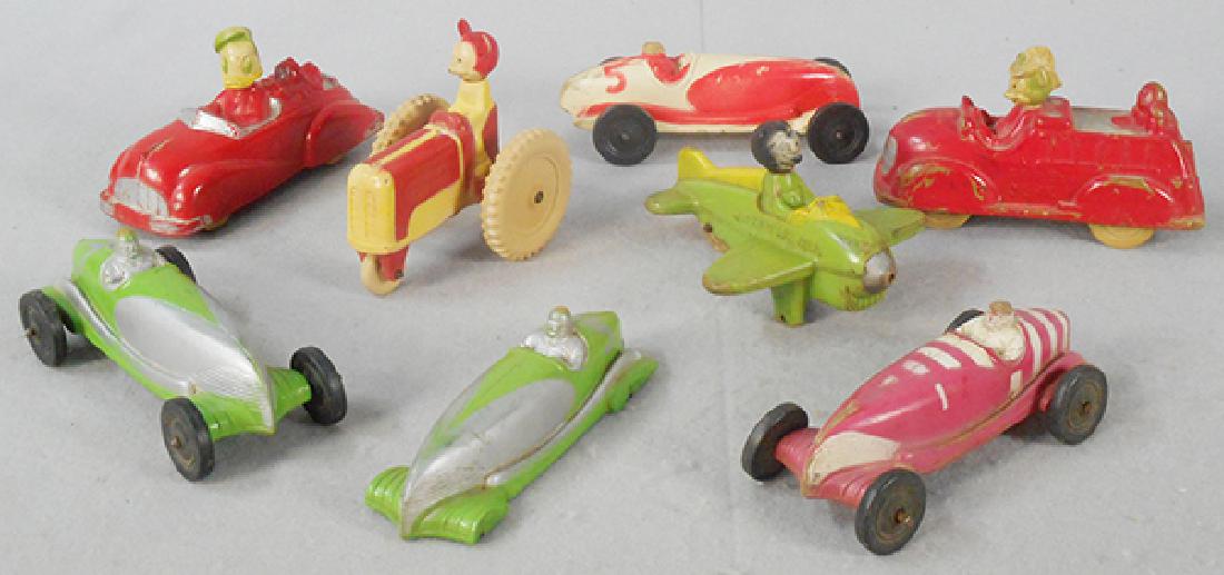 8 VICEROY DISNEY RUBBER TOYS: 4 Racers, 6 1/2 in long, 1 missing wheels, Donald Convertible, 6 5/8 in long, friction not working, Mickey Tractor, 4 3/4 in long, friction, working, Mickey Airplane, 6 1/4 in long, missing wheels, pr