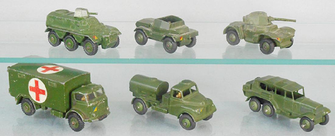 6 DINKY MILITARY VEHICLES: 676 Personnel Carrier, 673 Scout Car, 670 Armored Car, 626 Ambulance, 643 Water Truck, 151B Reconnaissance Car, C5-6.