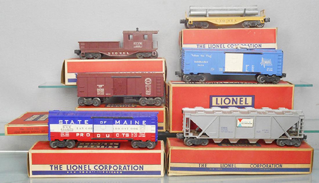 6 LIONEL FREIGHT CARS: O ga, 6436 Alcoa hopper, 6464-275 SOM box car, 3424 operating brakeman w/3424-100, 6454 SP box car, 6121-60 pipe car, 6119-50 work caboose, orig boxes minor wear, C7-8.