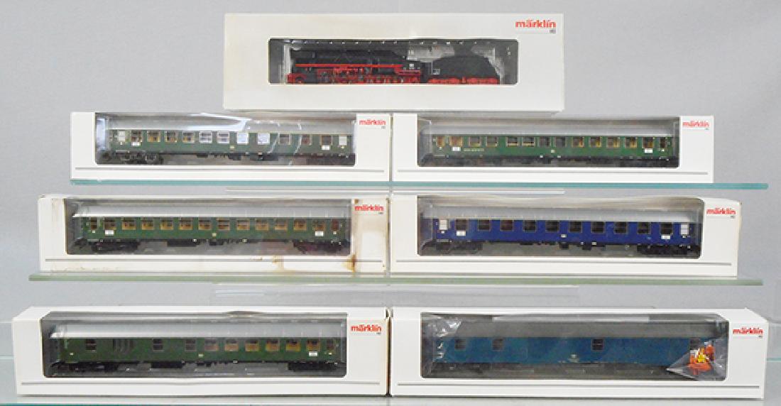 MARKLIN TRAIN SET: HO ga, 37883 loco & tender, w/cars 43920, 43940, 43910, 43930, 43950, 49965, orig boxes minor wear & some have water damage warping, C9.