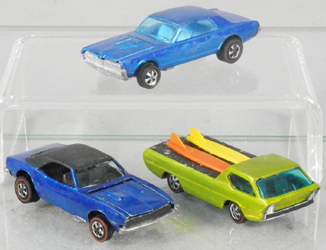 3 HOT WHEELS RED LINE AUTOS: blue 1967 Custom Cougar, blue 1967 Custom Camaro, antifreeze 1967 Deora, C6-7.