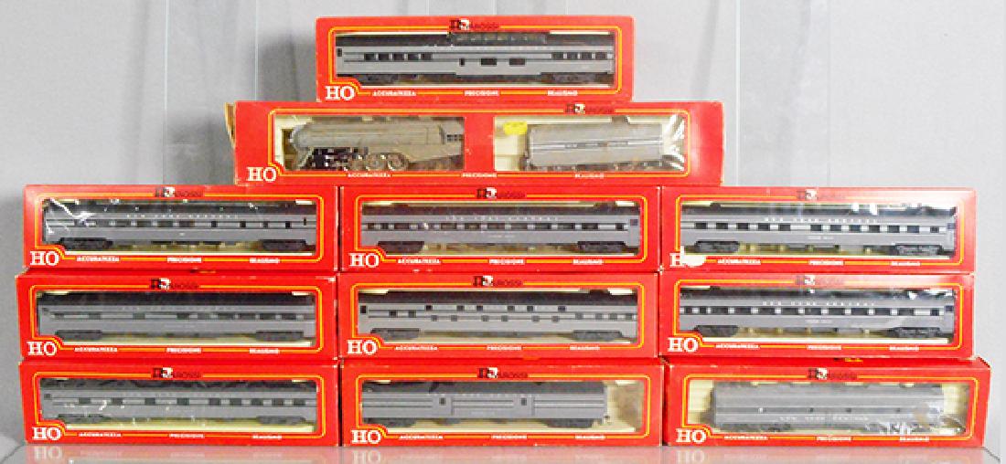RIVAROSSI NYC PASSENGER TRAIN SET: HO ga, 2-rail, 1252 NYC Hudson loco & tender, 6118 EMD E-8 w/9 coaches, orig boxes some wear, loco & tender box worn, C8-9.