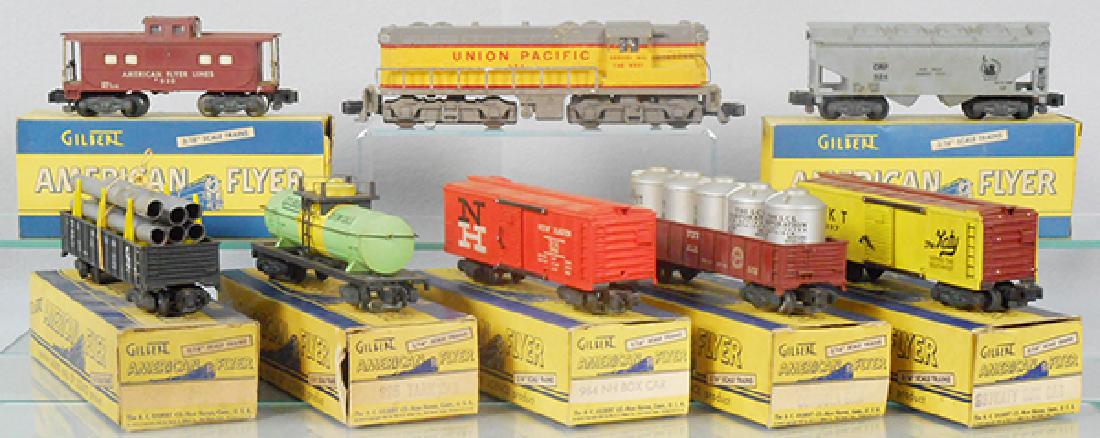 AMERICAN FLYER TRAIN SET: S ga, 372 UP loco, 911 gondola w/pipes, 910 Gilbert tank, 984 New Haven box car, 911 gondola w/canisters, 937 MKT box car, 924 JC hopper, 930 caboose, step broken, orig car boxes only, boxes worn, C6-