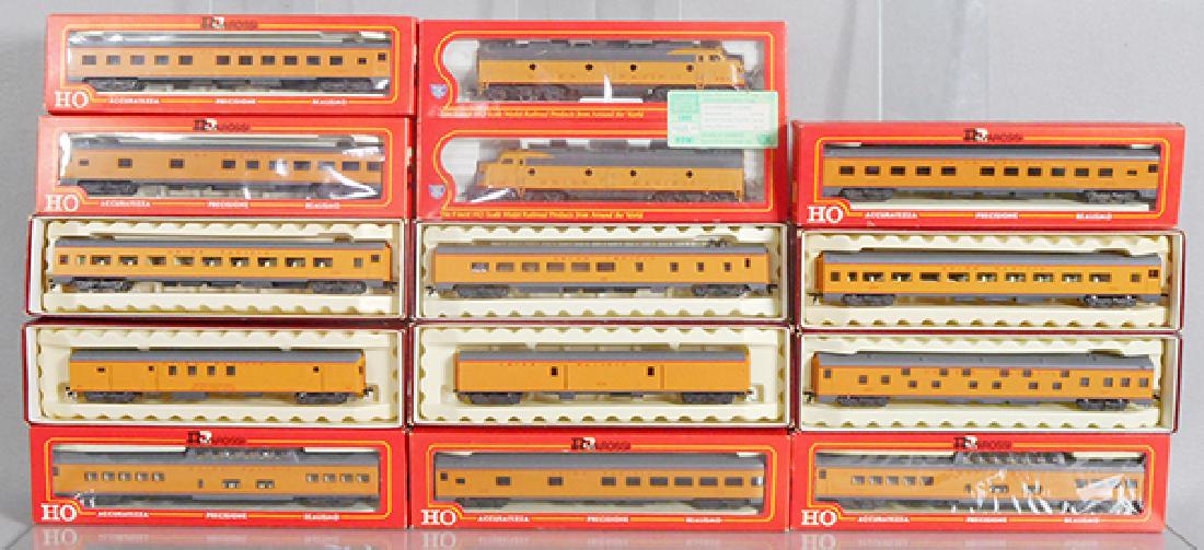RIVAROSSI UP PASSENGER TRAIN SET: HO ga, 2-rail, 1932 E8 AA unit, 1 not powered, w/12 UP coaches, orig boxes & inserts minor wear, C8-9.