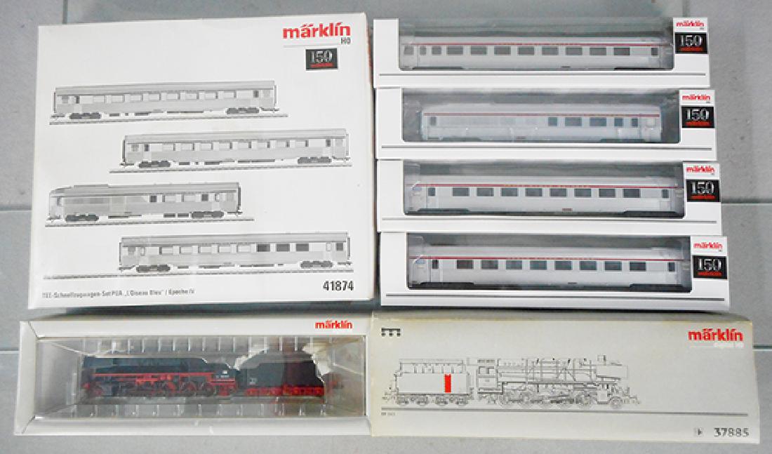 MARKLIN TRAIN SET: HO ga, 37885 loco & tender w/41874 4-car TEE set, orig boxes waterstained & some warping, C9-10.